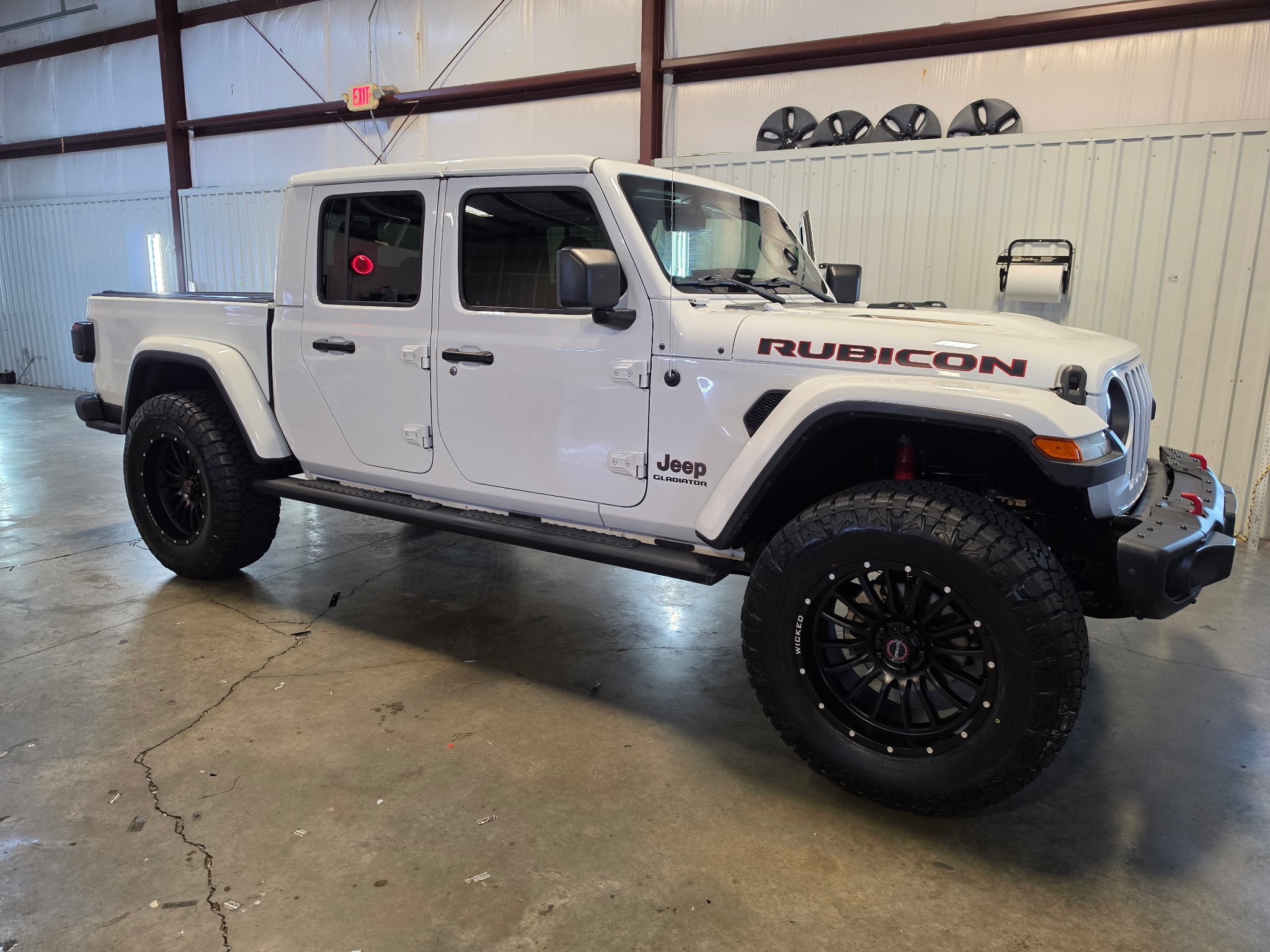 White Jeep Gladiator Rubicon in the Tint Clinic shop