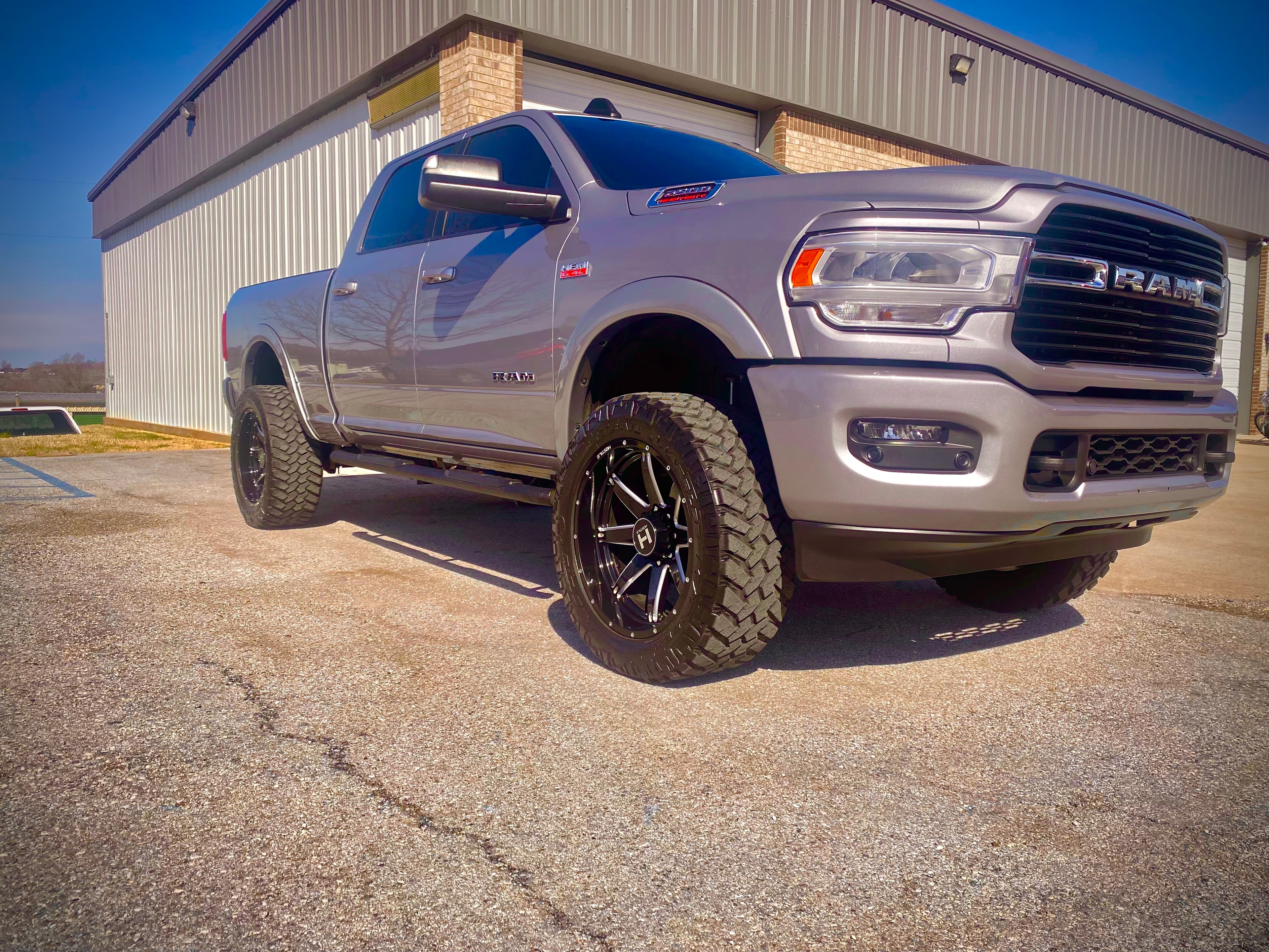 Lifted silver Ram 2500 — Tint Clinic customer build