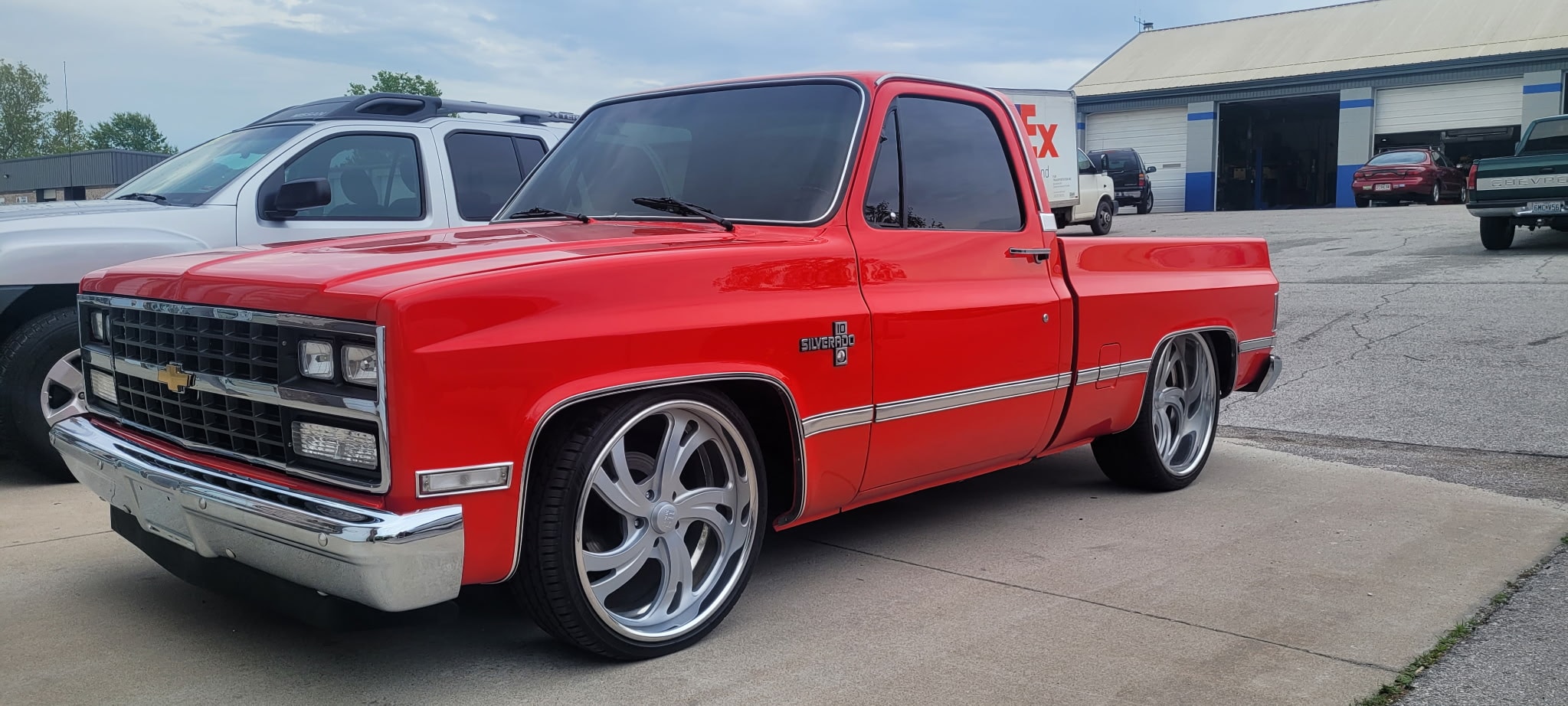 Red Chevrolet Silverado custom pickup