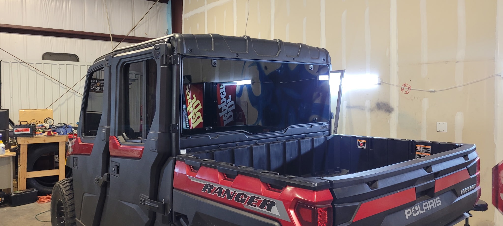 Red and black Polaris Ranger truck bed